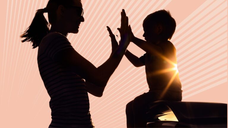 parent and child in silhouette